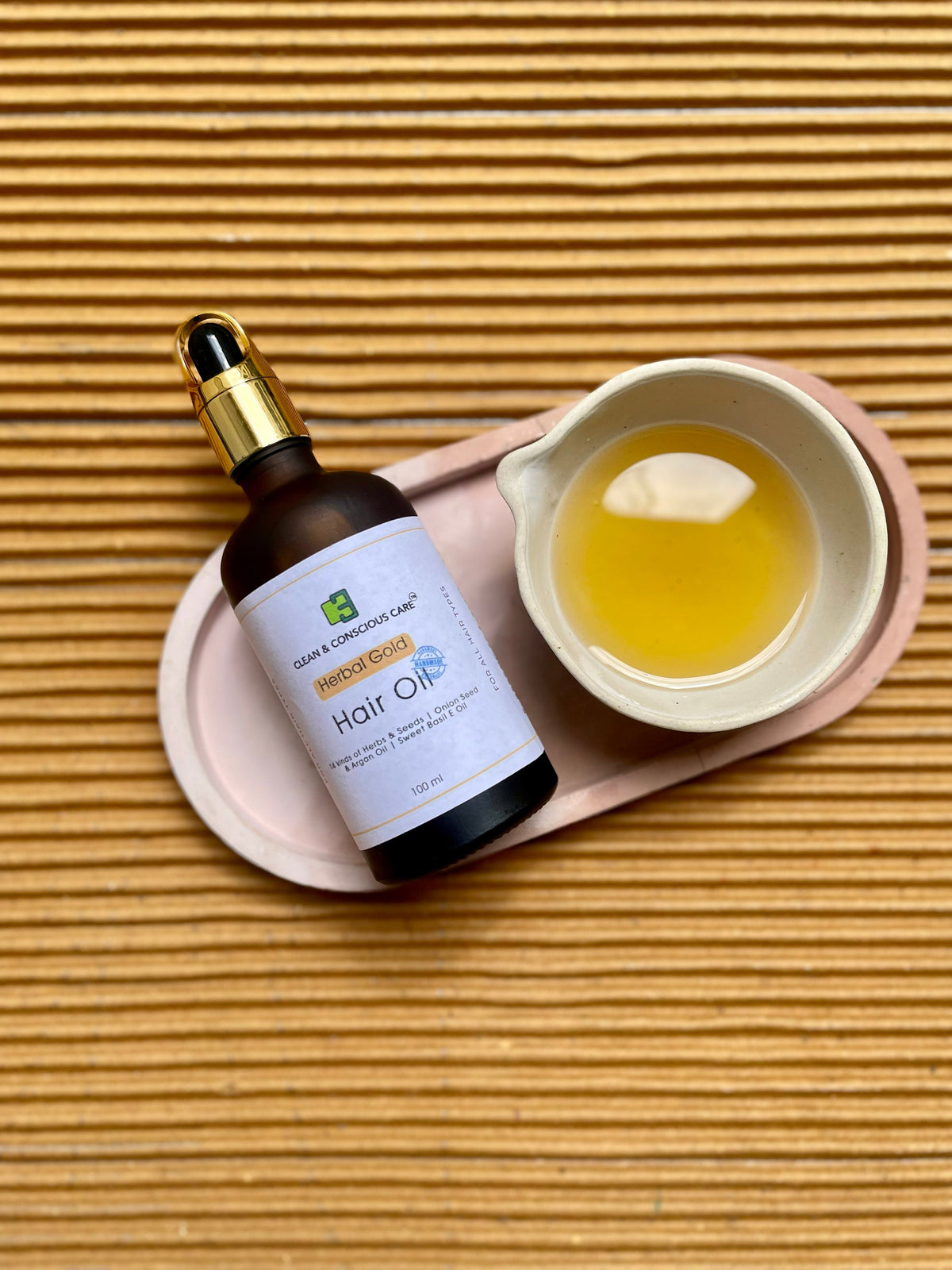 Herbal Gold nourishing hair oil with 14 herbs, goat milk and argan oil