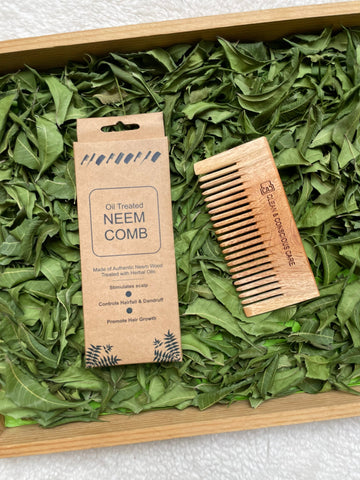 Neem wood detangler comb with wide teeth for gentle detangling