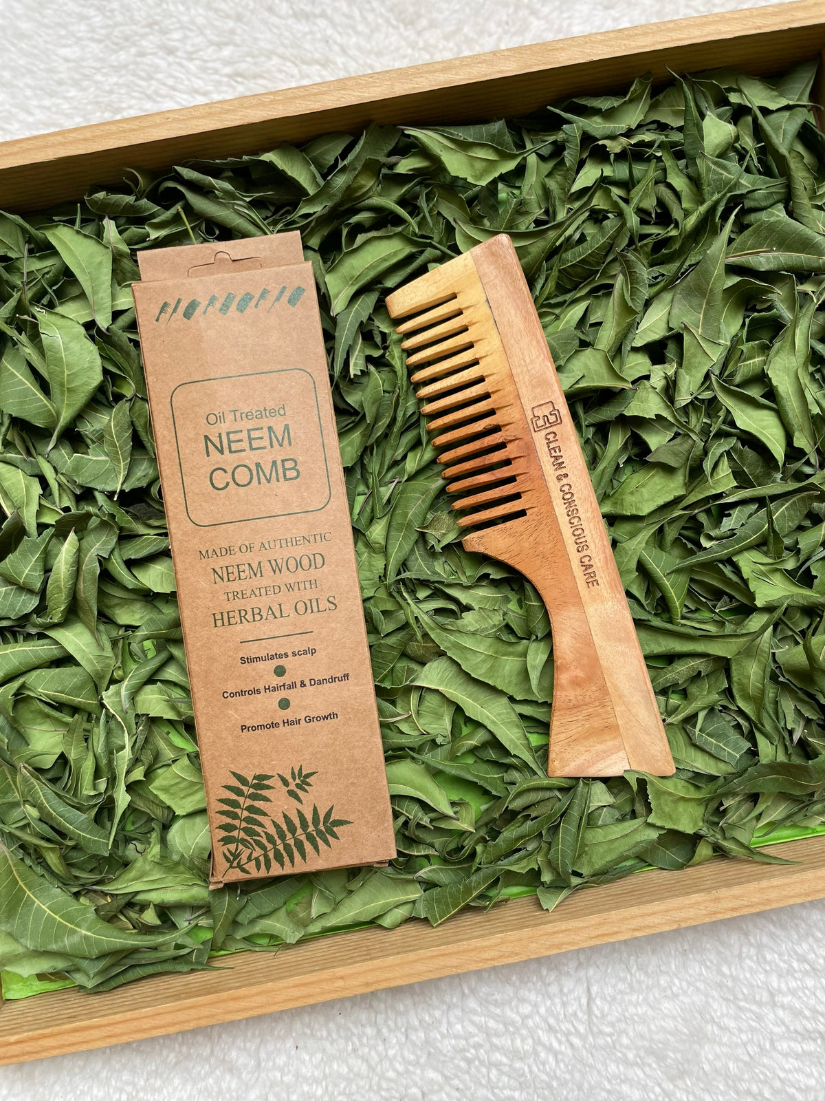 Handcrafted neem wood comb with handle for long, thick or curly hair